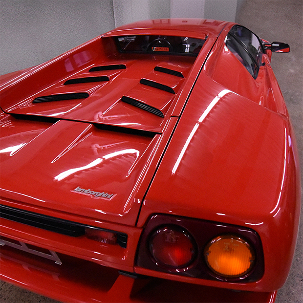 The Ontario Dealer cover photo - red Lamborghini